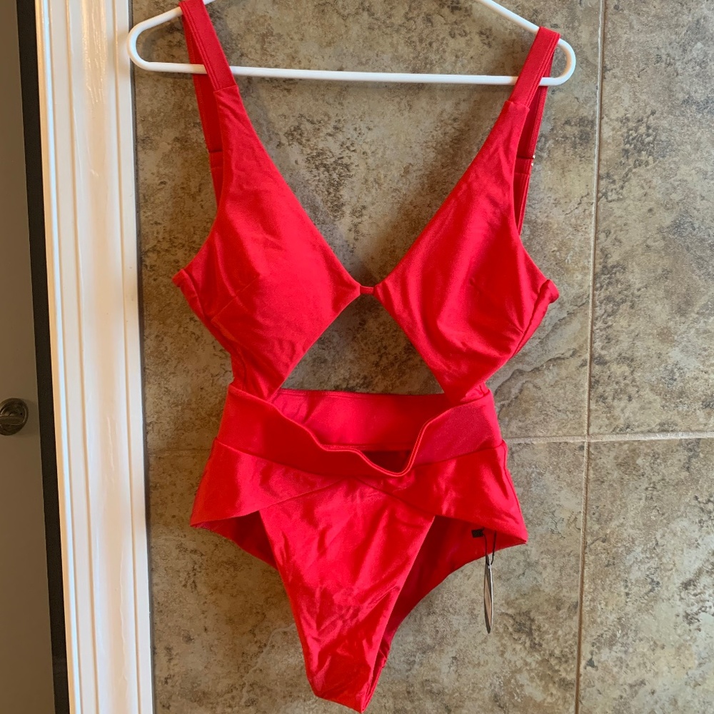 Marcia Maxwell red one piece